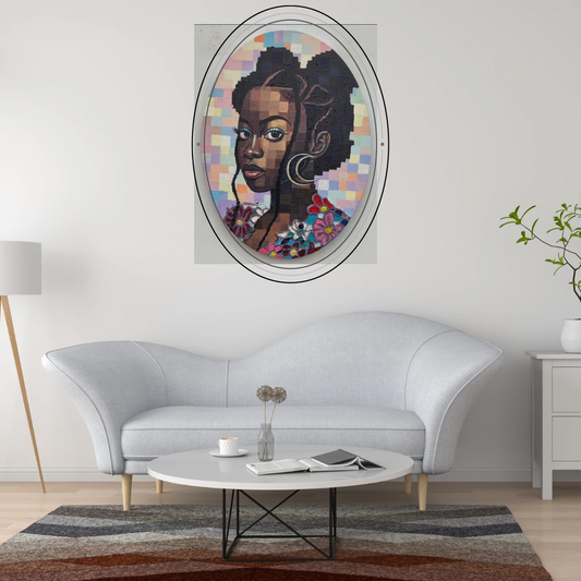 A Quiet Bloom I mixed media painting by Olamilekan Okunade displayed in an oval frame on a grey wall in a modern living room with a white sofa and round coffee table