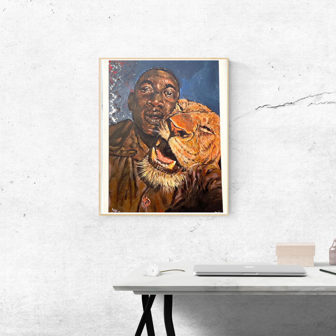 Pride with no Ego painting by Falex displayed in a gold frame on a grey wall above a modern white desk with minimalist decor